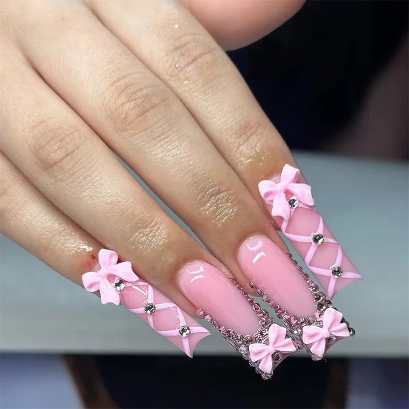 24pcs long coffin French press-on nails in black, featuring elegant bow and diamond details. Chic ballerina-style acrylic nails for a glamorous manicure in minutes.