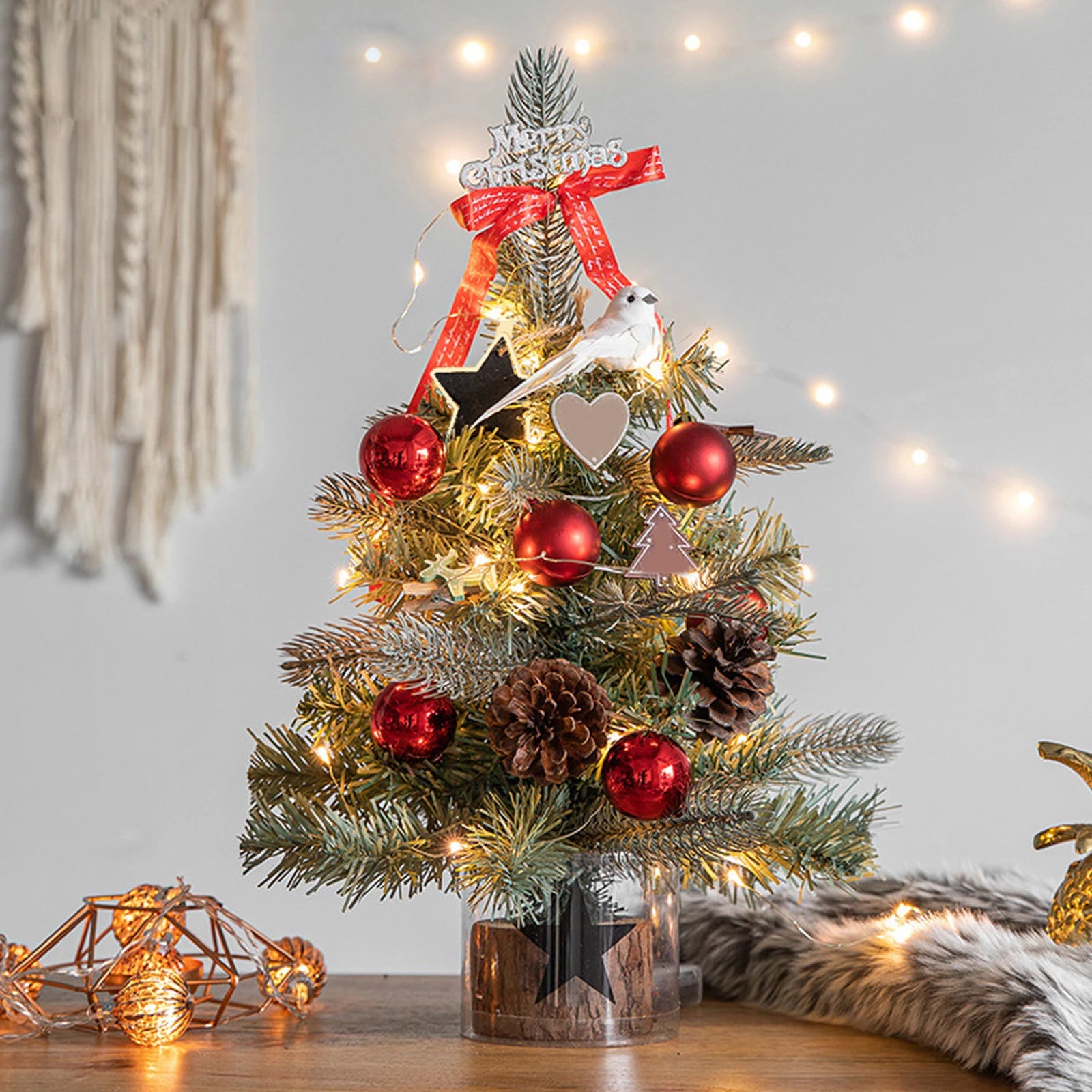 Add a festive touch to your home or office with this adorable miniature Christmas tree. Perfect for desks, tables, or as a Christmas gift.