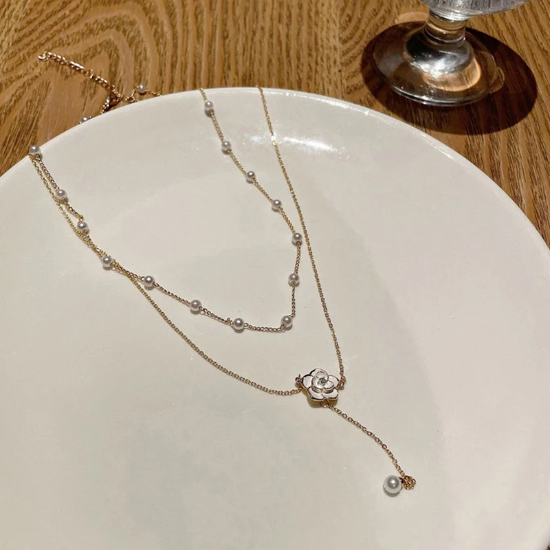Double layered tassel pearl necklace for female niche design camellia collarbone chain light luxury high-end feel temperament ne