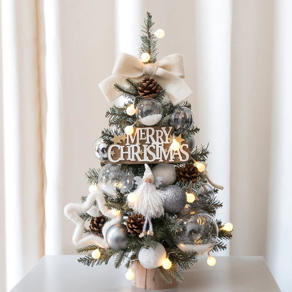 Add a festive touch to your home or office with this adorable miniature Christmas tree. Perfect for desks, tables, or as a Christmas gift.