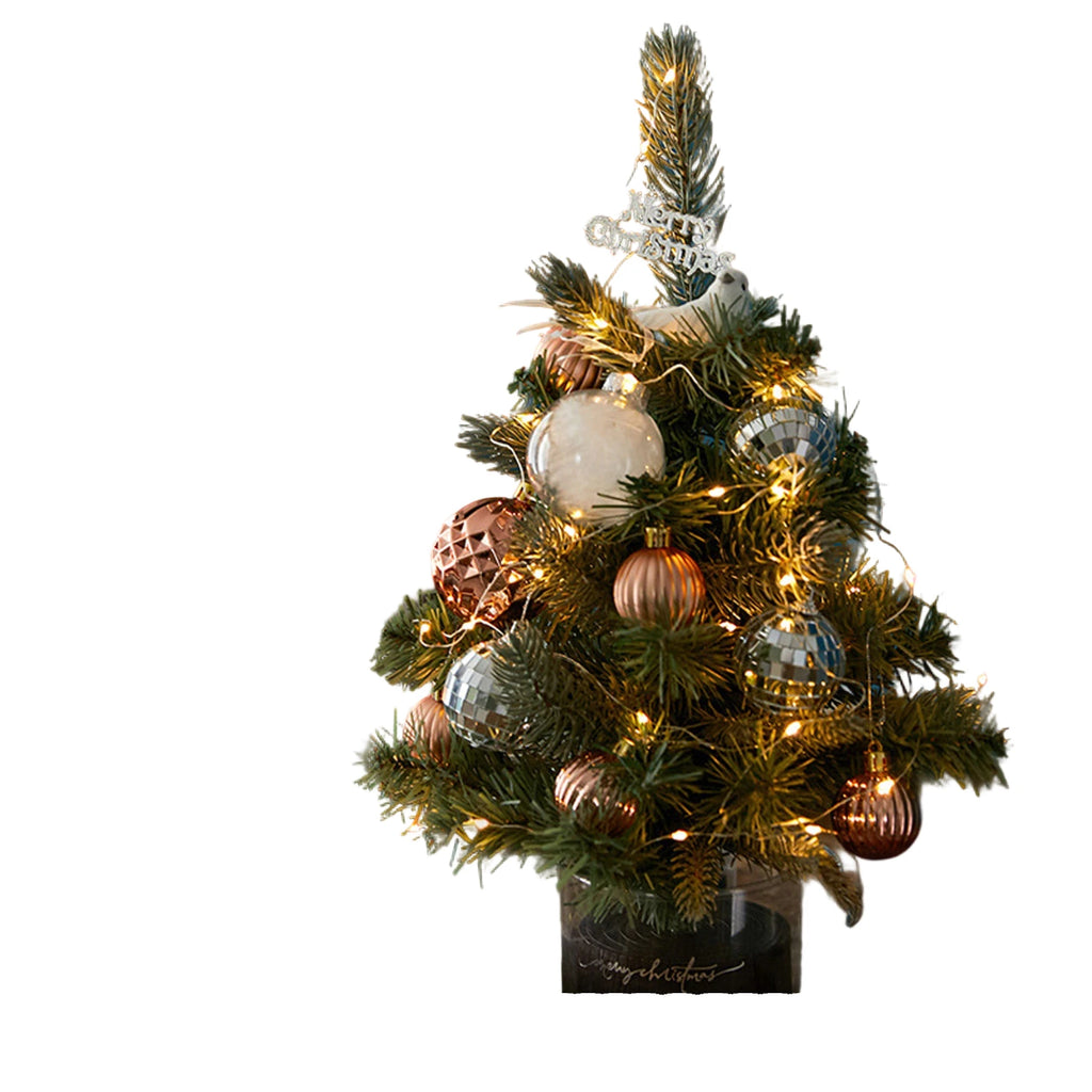 Add a festive touch to your home or office with this adorable miniature Christmas tree. Perfect for desks, tables, or as a Christmas gift.