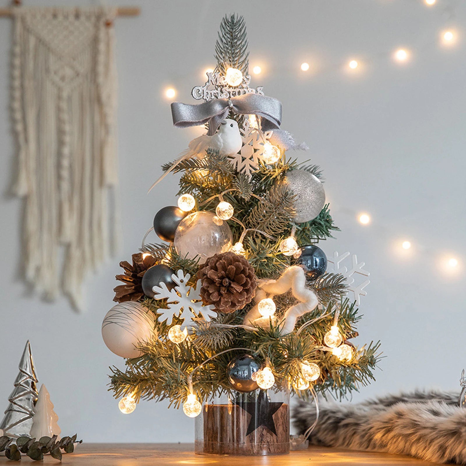 Add a festive touch to your home or office with this adorable miniature Christmas tree. Perfect for desks, tables, or as a Christmas gift.