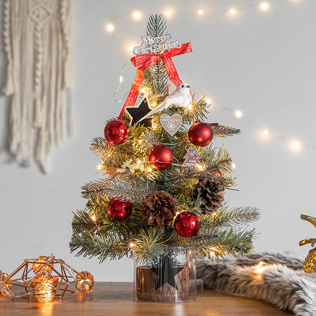 Add a festive touch to your home or office with this adorable miniature Christmas tree. Perfect for desks, tables, or as a Christmas gift.